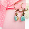 Vintage glass earrings, ocean blue and crystal. 