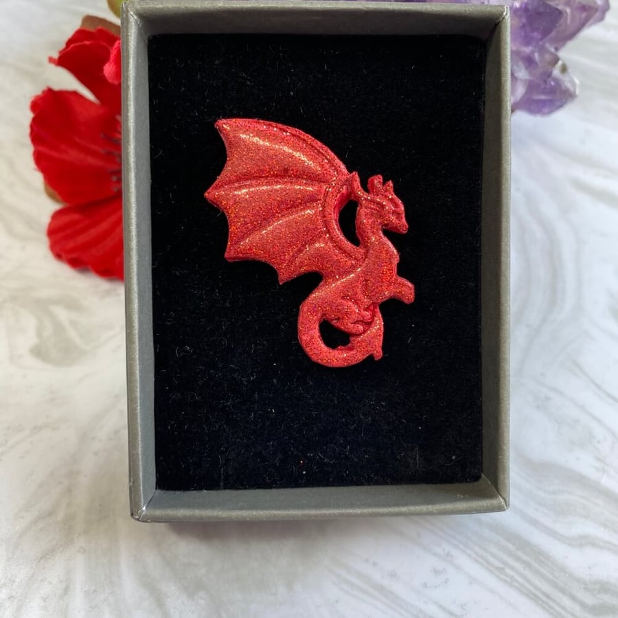 Red dragon glitter brooch handmade with polymer clay and resin.