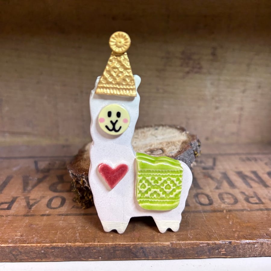 Perfectly Imperfect ceramic llama in a party hat
