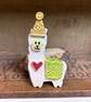 Perfectly Imperfect ceramic llama in a party hat