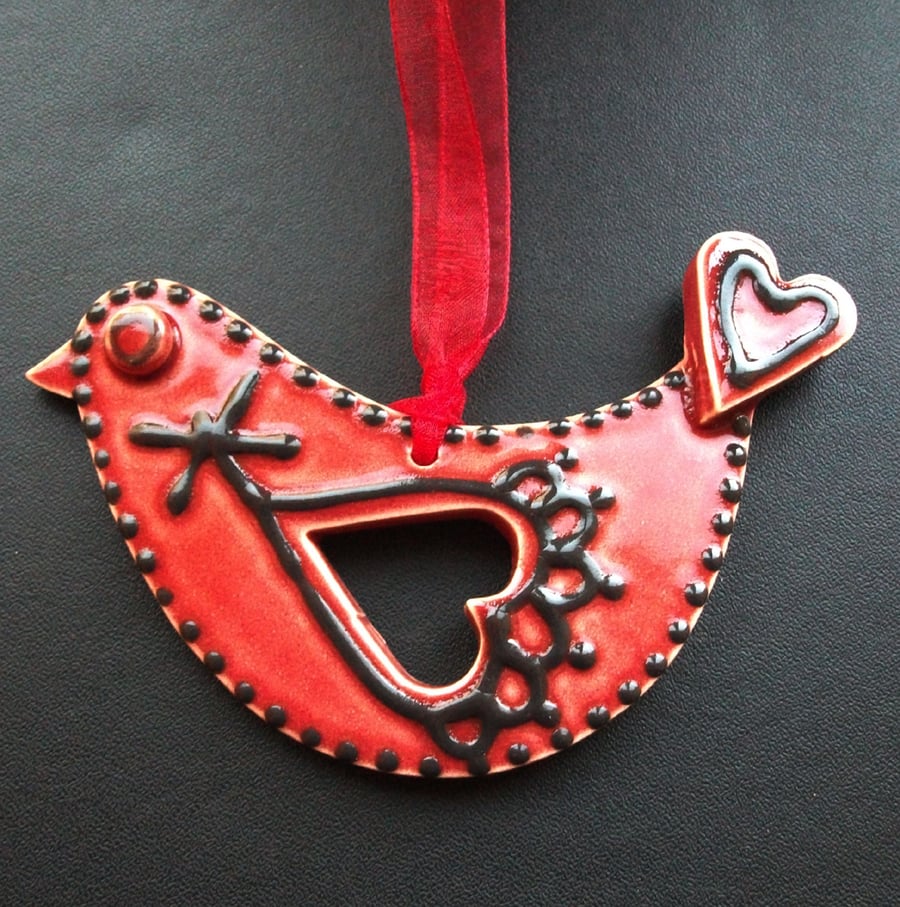 ceramic folk art  red bird decoration 