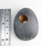 Pebble brooch with gilded hole that goes through the stone. Nature inspired. - Image 6