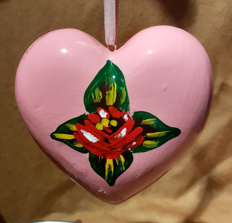 Pink heart shaped bauble with canal art style rose and daisy
