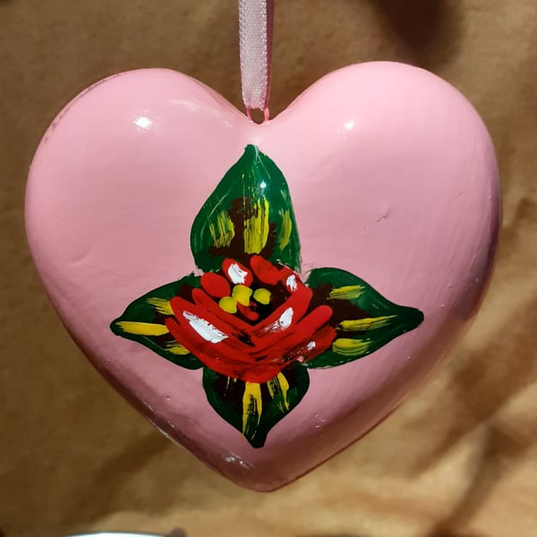 Pink heart shaped bauble with canal art style rose and daisy