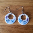 Hoop Dangle Earrings with a Flower and Butterfly Design