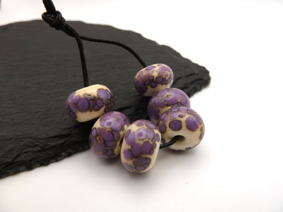 lampwork glass beads, ivory and purple frit