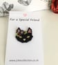 Black Cat Brooch - Black and Pastel Seed Bead Coat Pin - Image 1
