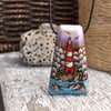 Lighthouse and a lavender sky pyrography wooden pendant. British coast necklace.