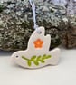 Teeny ceramic dove decoration with leaves and orange flower