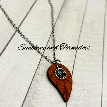 Handmade leaf pendant necklace with a nature-inspired woodland design.