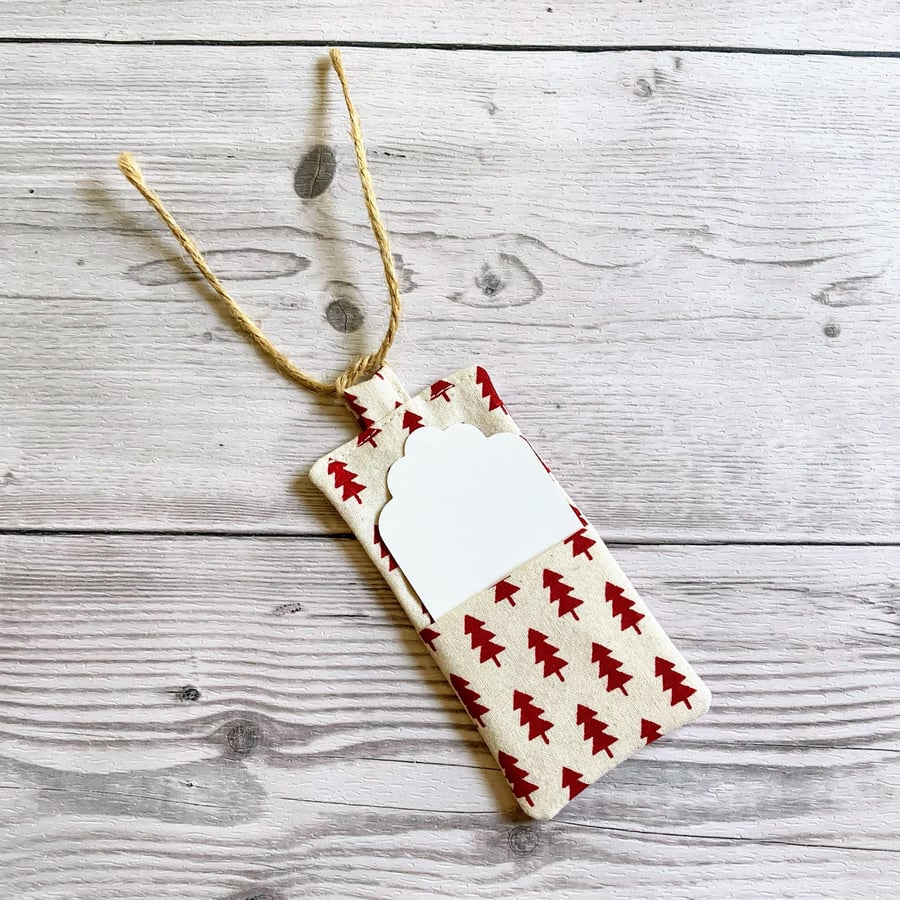 Red Christmas trees on cream cotton themed gift tags. 