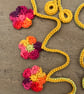 Crochet Garland of Small Bright Multicolour Flowers - Image 2