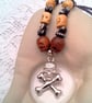 Skull & Crossbones Pendant on a Purple Bead and Skull Bead Necklace, Halloween - Image 5
