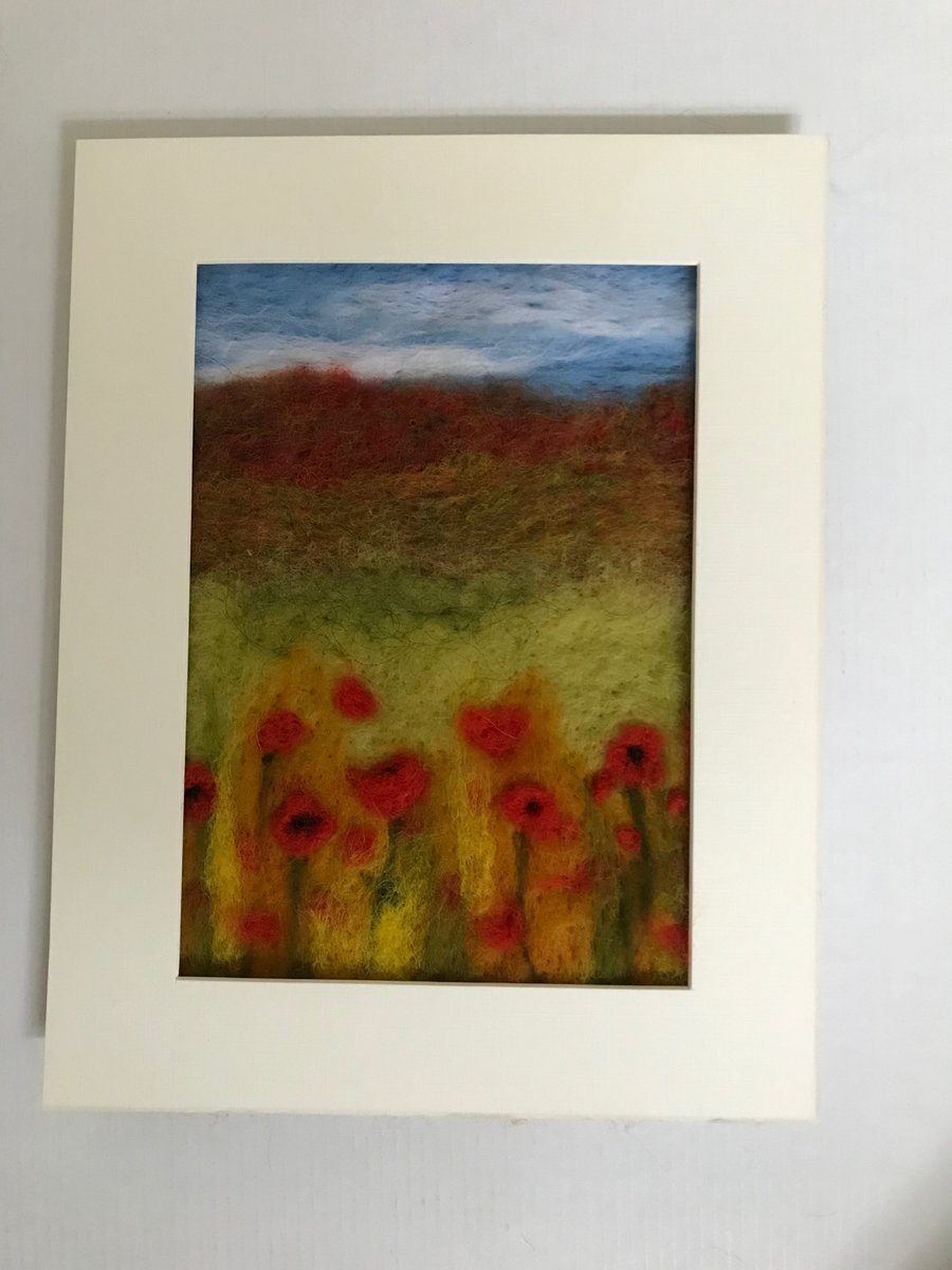 Unframed, needle felted landscape with poppies.