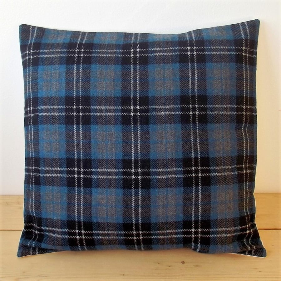 Cushion cover. Tartan plaid in blue, grey, black and white