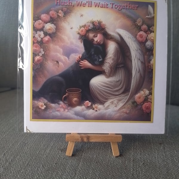 a picture of a old dog waiting in the arms off an angel to get his wings