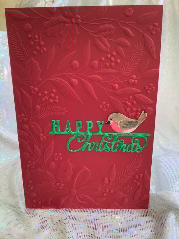 Christmas in a vibrant red with Little Red Robin sending you greetings.