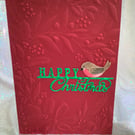 Christmas in a vibrant red with Little Red Robin sending you greetings.
