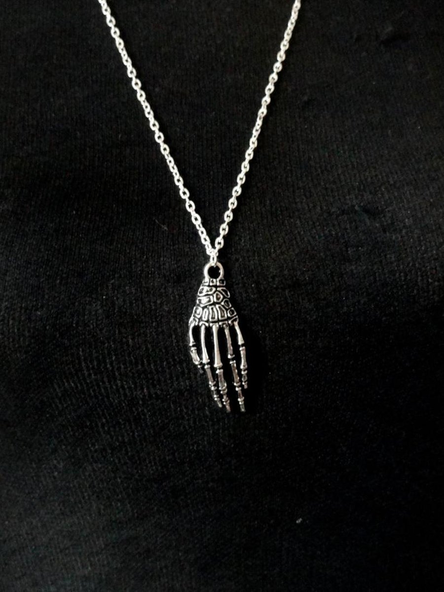 Long skeleton hand necklace