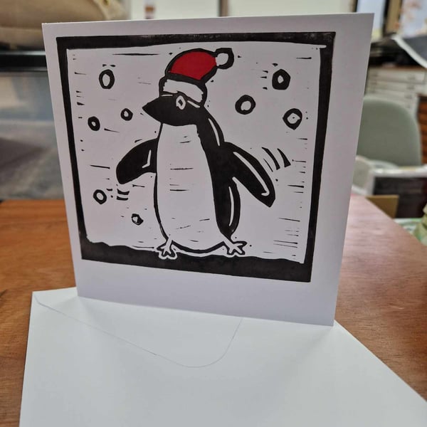 Wiggly Christmas Penguin lino printed card.