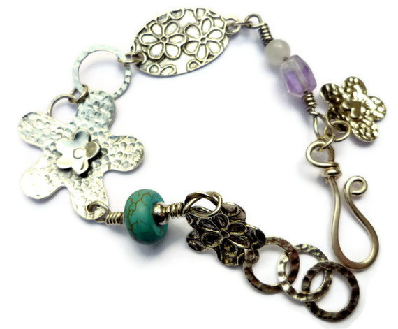 Silver bracelet with flowers