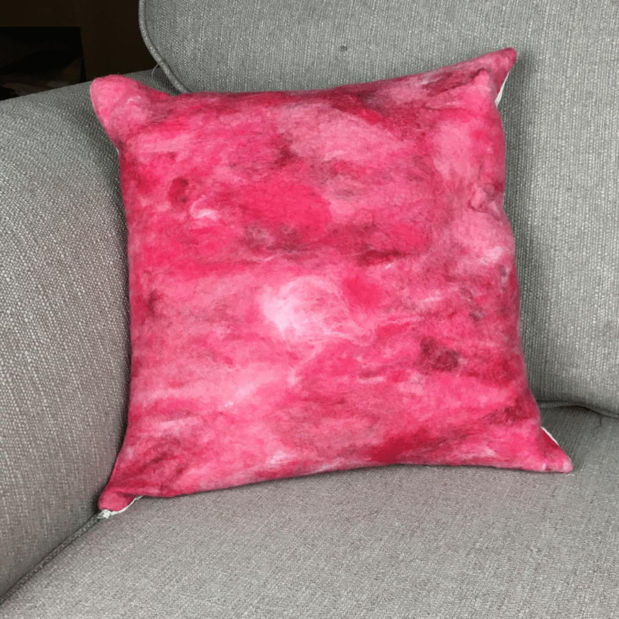 Felted merino wool cushion in shades of red and pink (15")