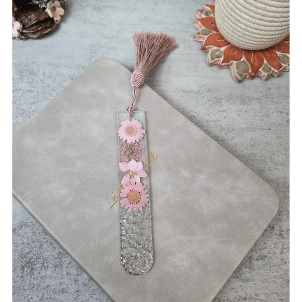 Daisy Dew Resin Bookmark adds a little sparkle to your read.