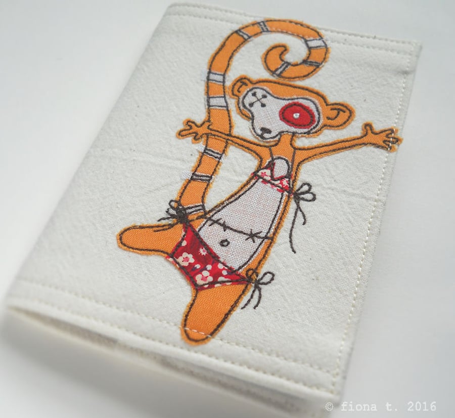 freehand embroidered passport cover - zombie lemur in orange