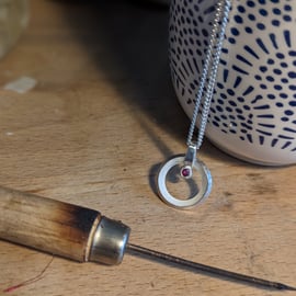 Circular Silver Pendant with Ruby