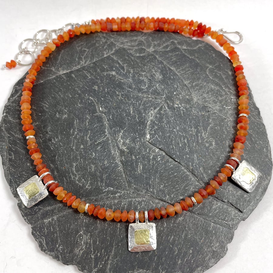 Bright orange carnelian necklace with silver and 18ct gold beads.