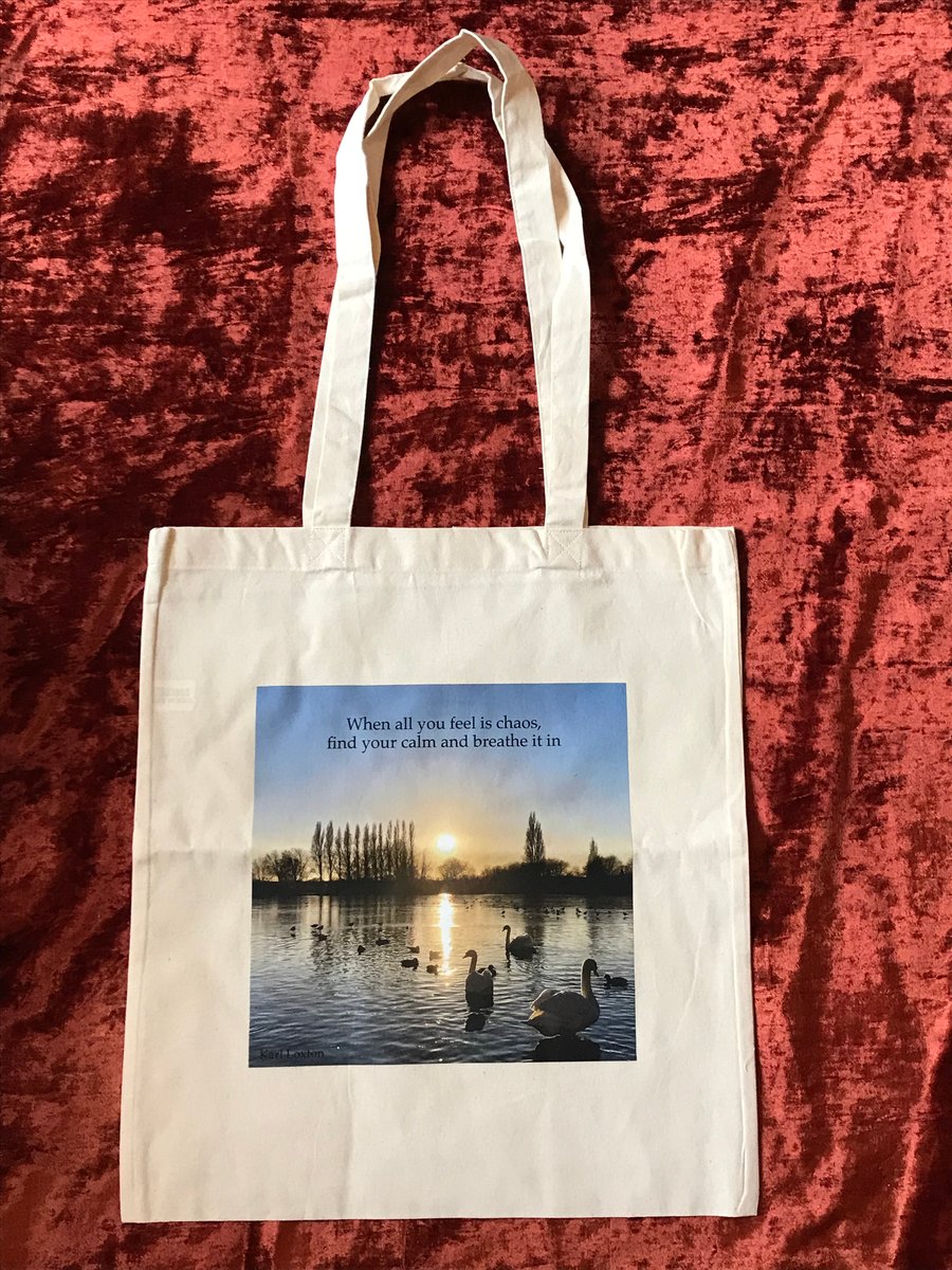 Swan cotton tote bag "Calm in the chaos" by Karl Loxton