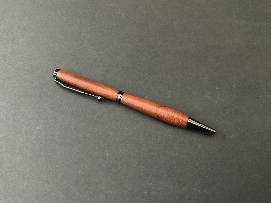 Slimline twist ballpoint pen made with pink ivory hardwood - black ink