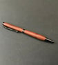 Slimline twist ballpoint pen made with pink ivory hardwood - black ink - Image 1