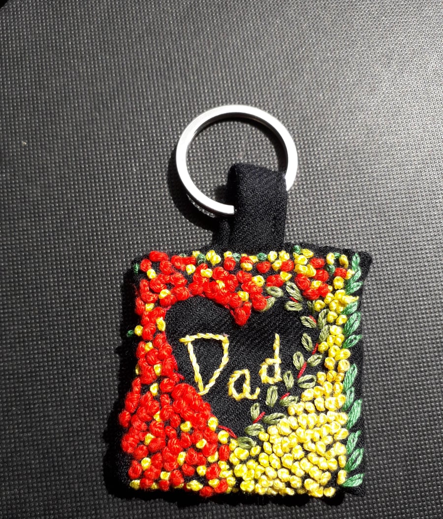 Handmade keyring with Hand Embroidered design on pure soft wool