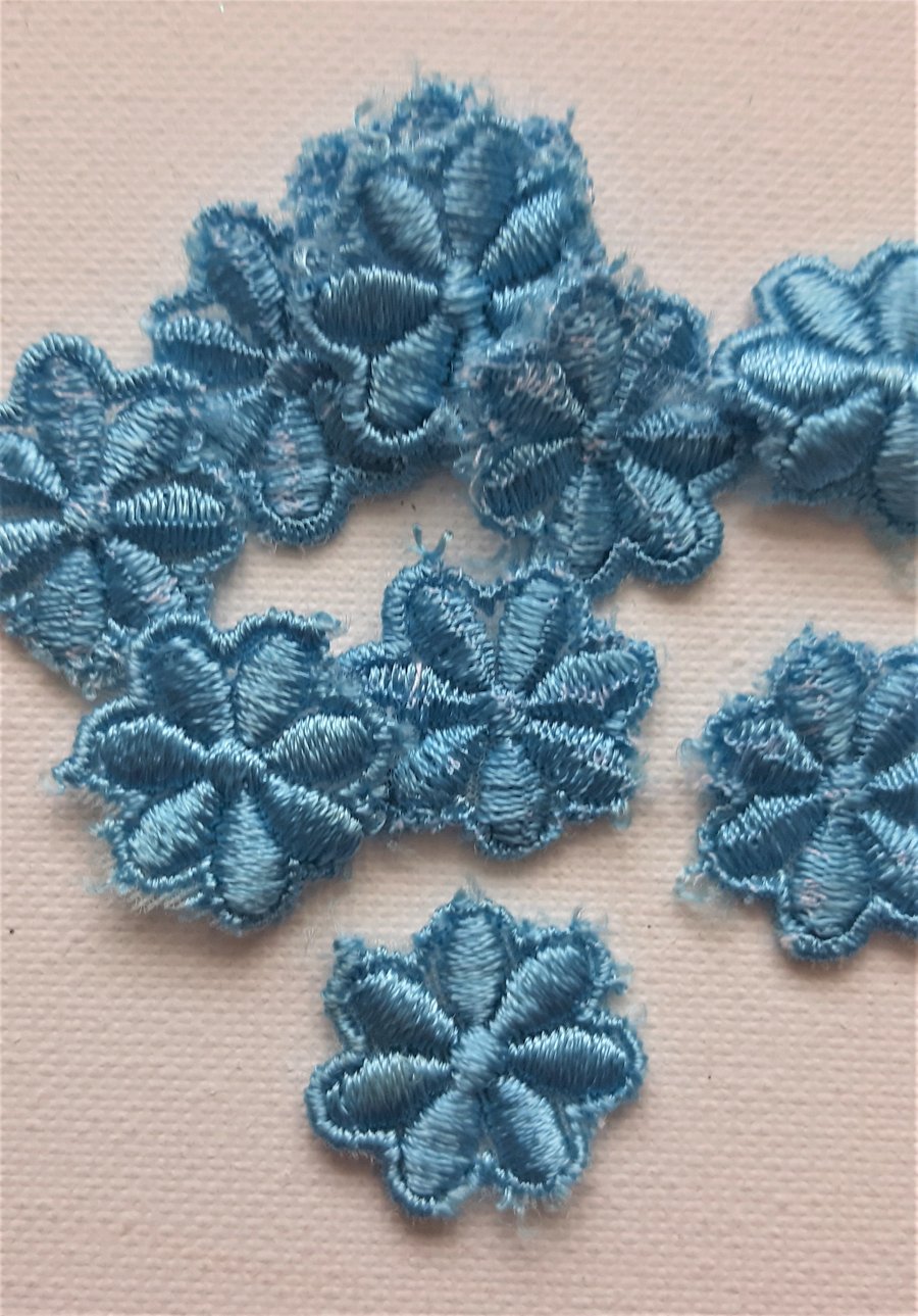 20 blue flower embellishments approx. 2.3cm wide