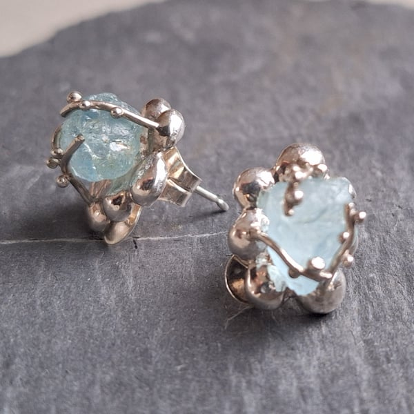 Silver earrings with natural freeform aquamarine.