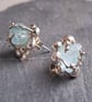 Silver earrings with natural freeform aquamarine.