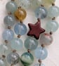 Beryl morganite necklace with howlite star on knotted cord - Image 5