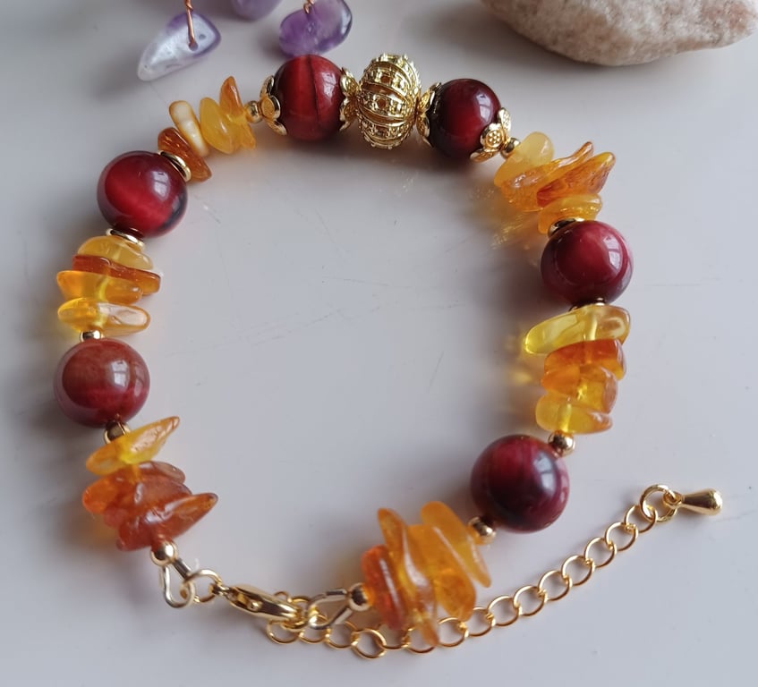 Cat's eye and amber beaded bracelet with golden plated adjustable chain