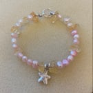 Beautiful citrine and freshwater pearl bracelet with silver toggle fastener..