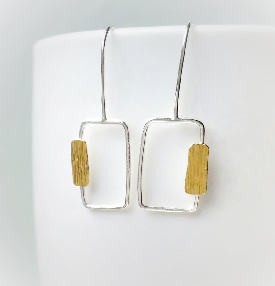 Nature inspired minimal silver earrings with gold detail