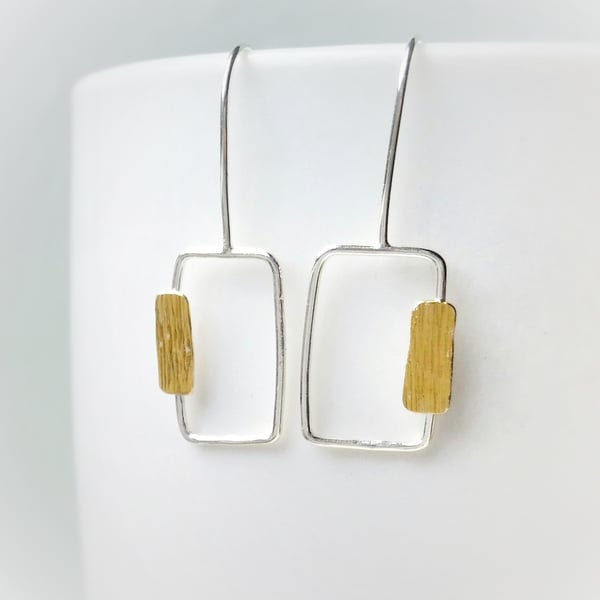 Nature inspired minimal silver earrings with gold detail