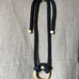 Knotted rope necklace with single small wooden ring