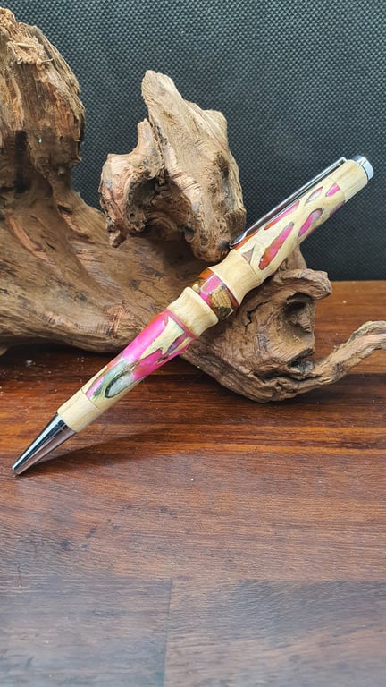 Neon pink resin pen.