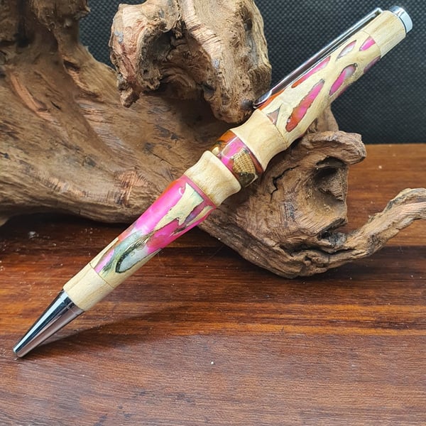 Neon pink resin pen.