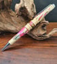 Neon pink resin pen.