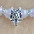 Lilac beaded bracelet with three wolf heads 