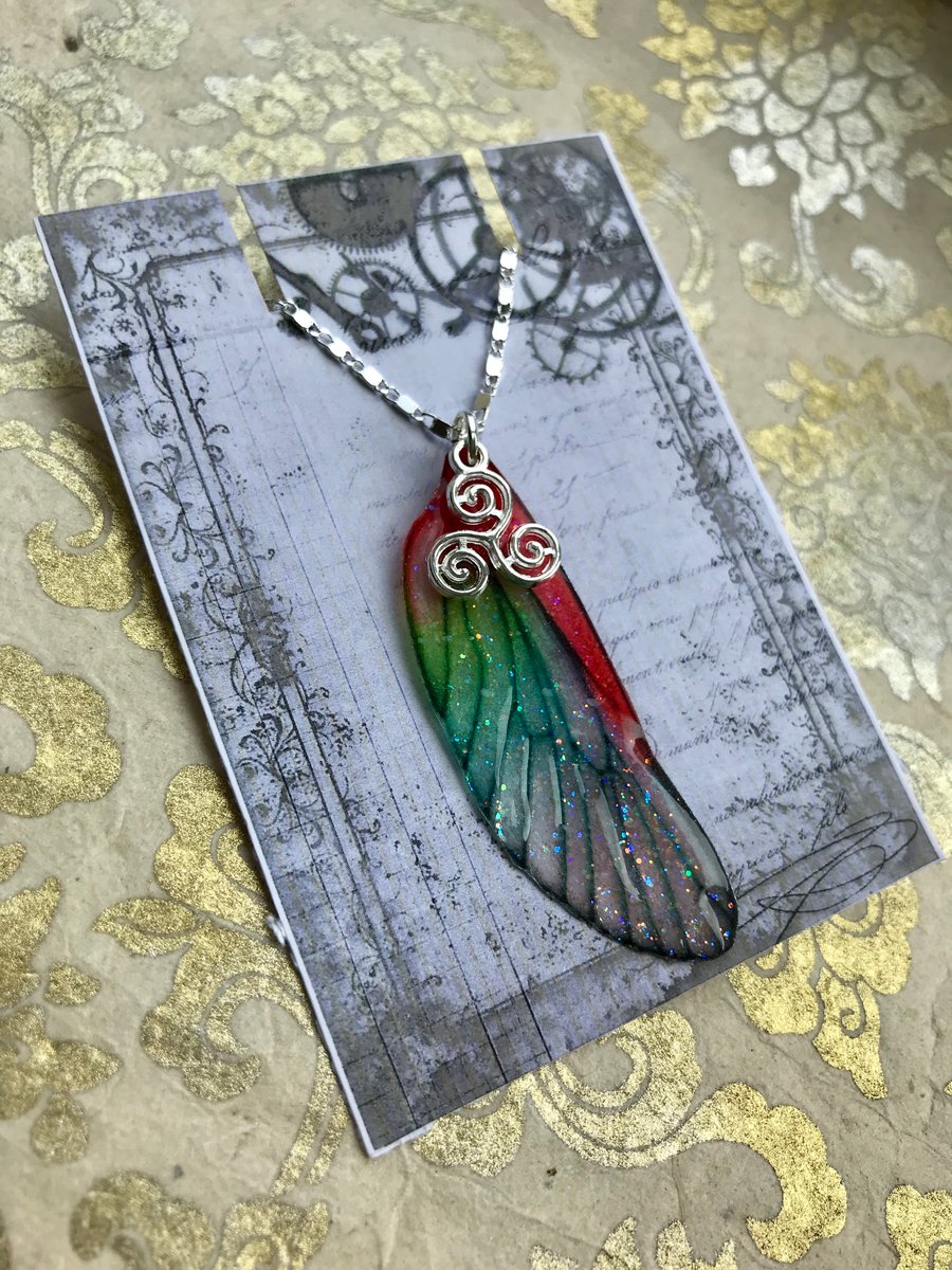 Red and green sparkling sterling silver triskelion fairy wing necklace