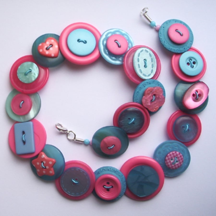 Hot pink and aqua button necklace