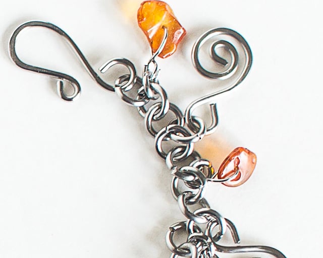 Stainless Steel and Amber Charm Bracelet Amber Chips Spiral Charms Handmade
